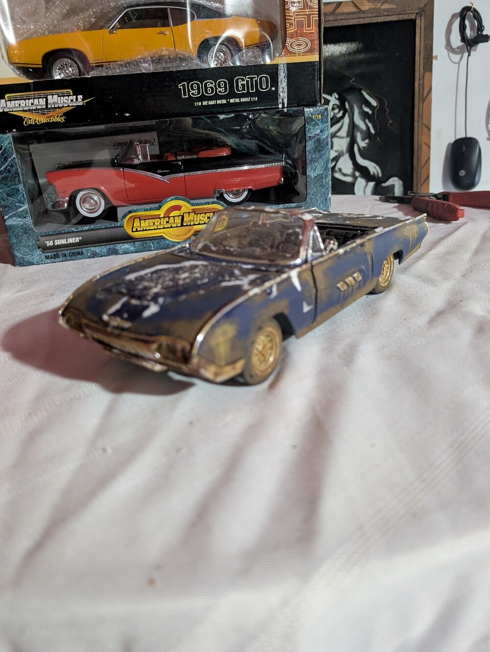 appears to be a 1:18 scale diecast model of a 1963 Ford Thunderbird convertible